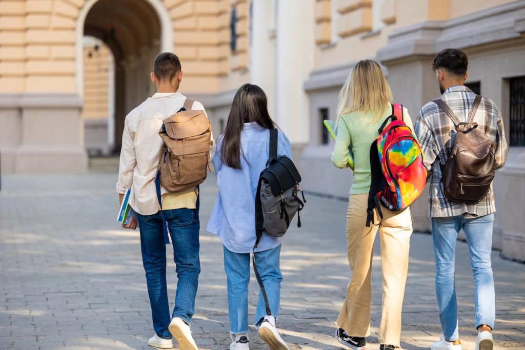 College Students Walking On Campus