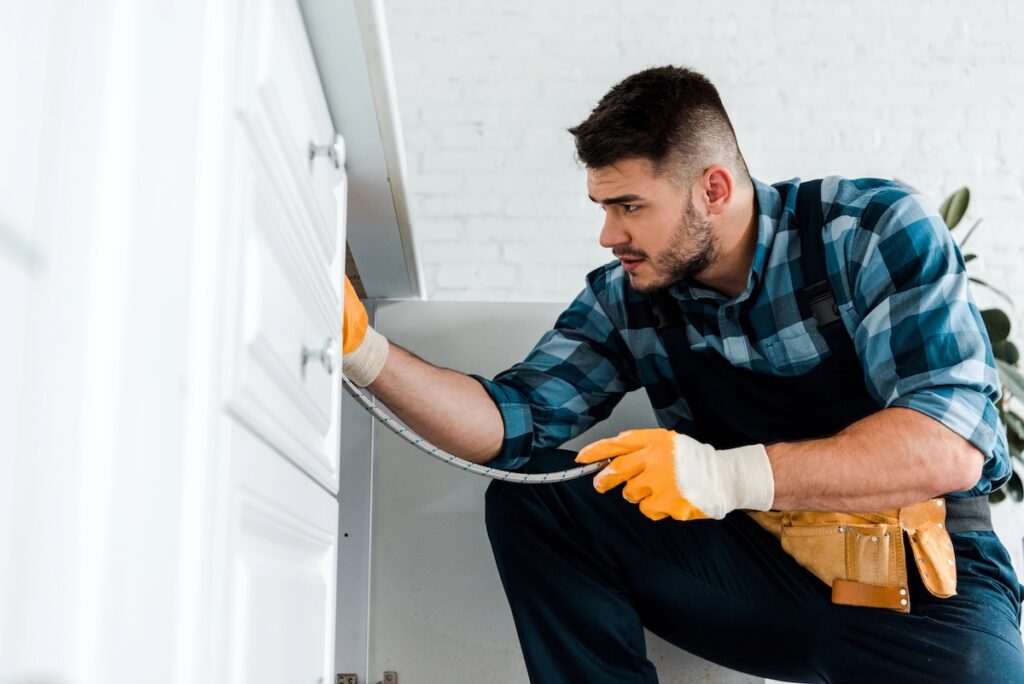 Handyman Fixing Kitchen Sink