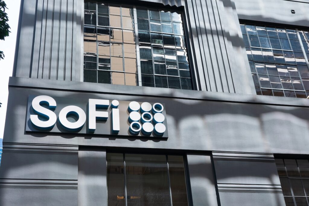 SoFi logo sign on headquarters facade. Social Finance is an online personal finance company - San Francisco, California