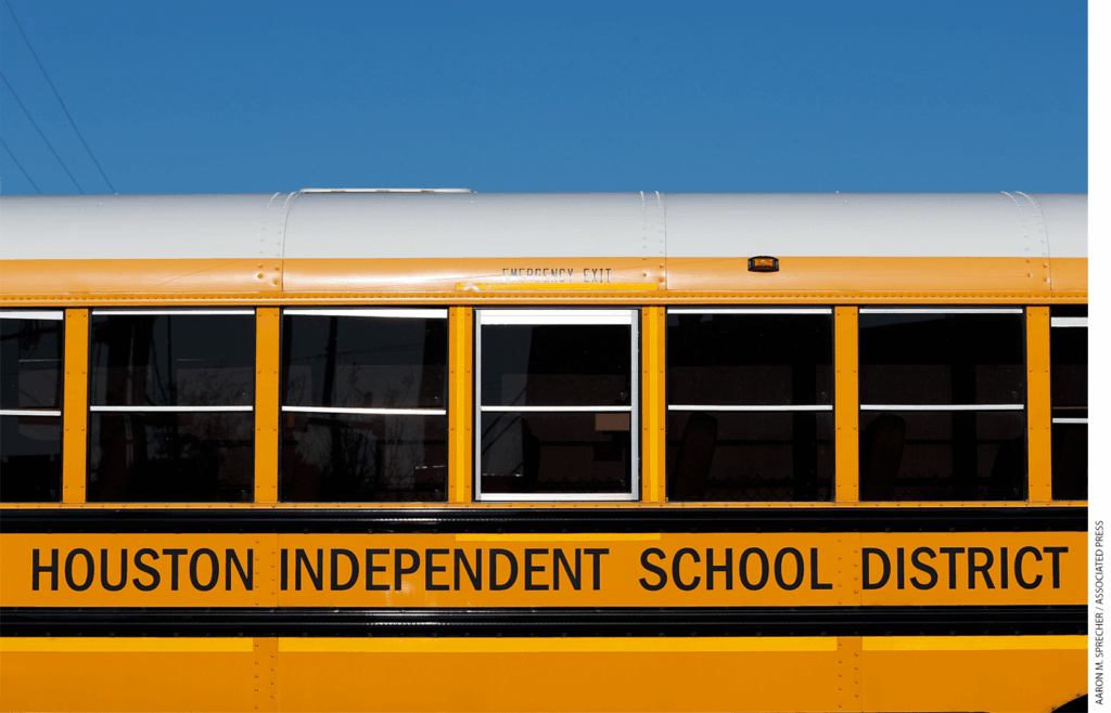 Photo of the side of a school bus from Houston Independent School District